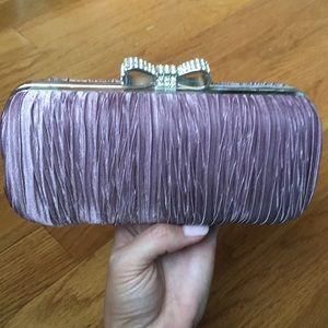 Lavender clutch with crystal bow